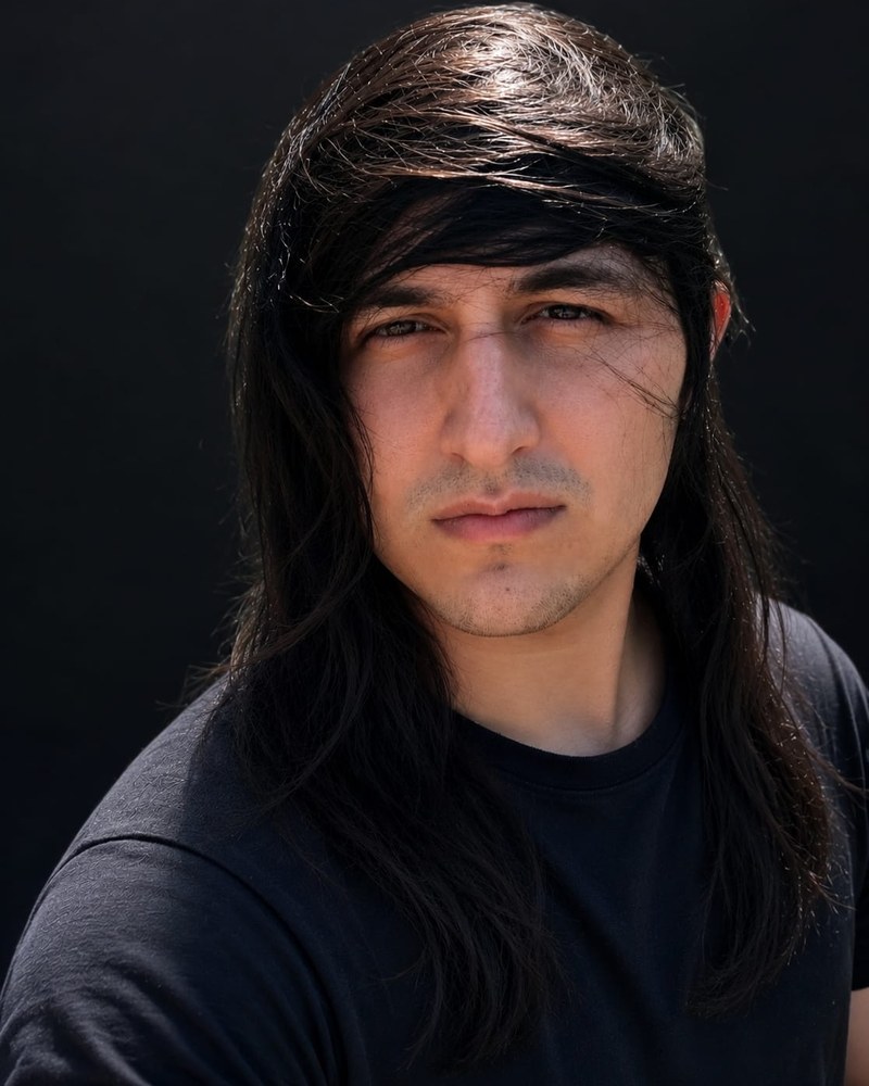 Retrato de talento sobre fondo oscuro